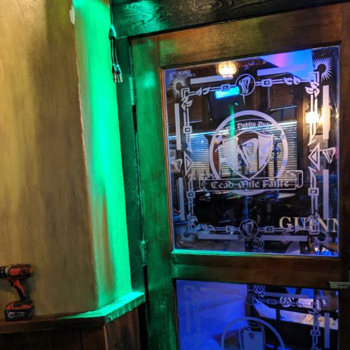 dublin-4 The Dublin Pub - Green Lighting by Glass Door