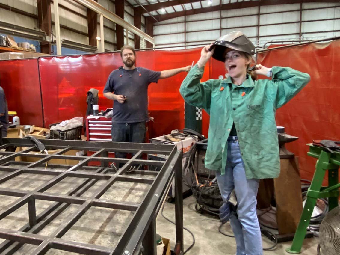 Kate and Eli enjoying welding