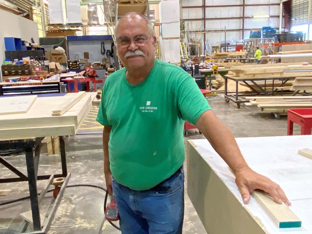 Brad smiling in the Scenic Solutions workshop