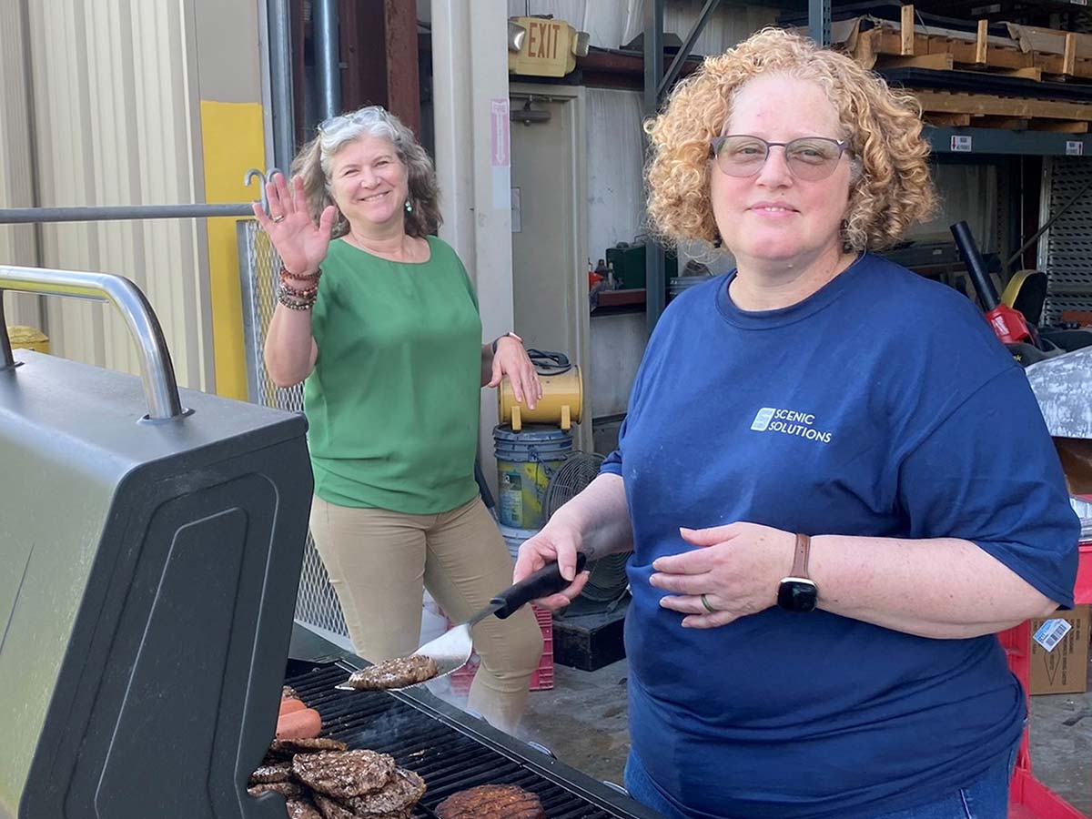Veronica and Mary Beth grilling out at the Scenic Solutions production facility